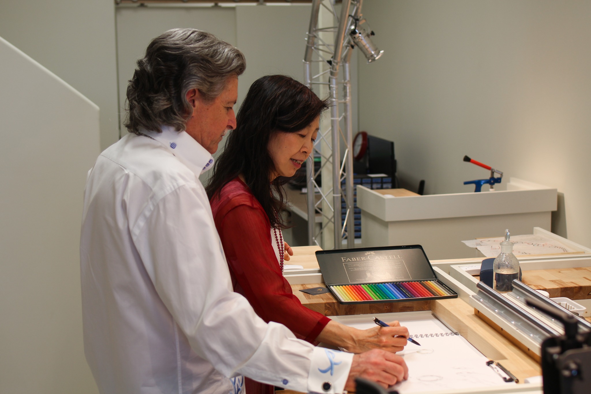 Greg and Kanae designing jewelry together